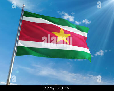 Suriname National Flag Waving on pole against sunny blue sky background. High Definition Stock Photo