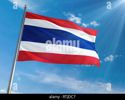 Thailand National Flag Waving on pole against sunny blue sky background. High Definition Stock Photo