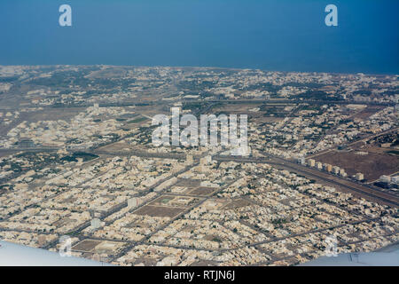 View from the plane of the city of Seeb, near Muscat (Oman) Stock Photo