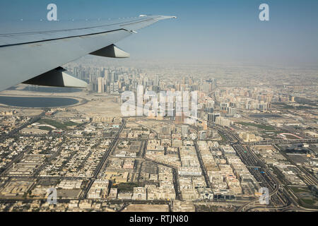 Dubai's buildings seen from the airplane taking off Stock Photo