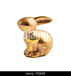 Golden rabbit figure isolated on white background. Design element. Stock Photo