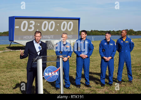 Kennedy Space Center, Florida, USA. 01st Mar, 2019. NASA Administrator Jim Bridenstine (L) speaks to the media as NASA Astronauts (from L) Doug Hurley, Bob Behnken, Mike Hopkins, and Victor Glover look on at the Kennedy Space Center in Florida on March 1, 2019 prior to the launch of a SpaceX Falcon 9 rocket carrying the unmanned Crew Dragon capsule. The rocket is set to lift off from Pad 39A at the Kennedy Space Center on its first flight, Demo-1, on March 2 at 2:49 a.m.EST. Credit: Paul Hennessy/Alamy Live News Stock Photo