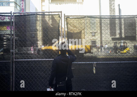 Santa Monica, California, USA. 25th Feb, 2013. A tourist takes a photo of The Kodak Theater the day after the Oscars. Credit: Robert Gallagher/ZUMA Wire/Alamy Live News Stock Photo