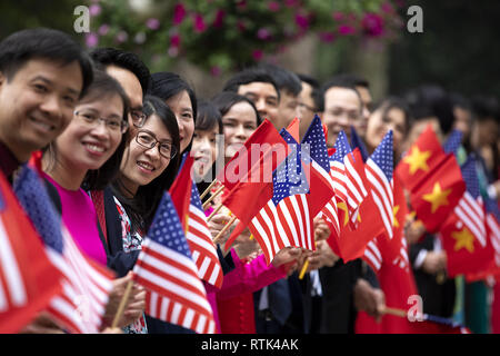 A crowd awaits the departure of President Donald J. Trump, following his meetings with Nguyen Xuan Phuc, Prime Minister of the Socialist Republic of Vietnam, at the Office of Government Hall Wednesday, Feb. 27, 2019, in Hanoi   People:  President Donald Trump Stock Photo