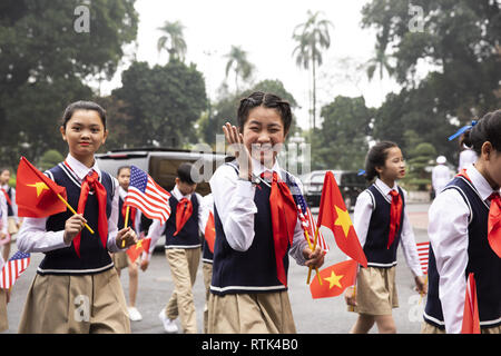 President Donald J. Trump is welcomed by children with flags and honor guards at the Presidential Palace Wednesday, Feb. 27, 2019, in Hanoi.  People:  President Donald Trump Stock Photo