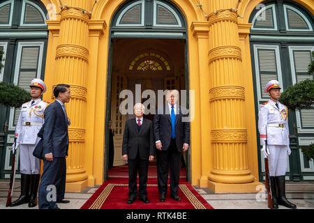 President Donald J. Trump is welcomed by Nguyen Phu Trong, General Secretary of the Communist Party and President of the Socialist Republic of Vietnam, to the Presidential Palace Wednesday, Feb. 27, 2019, in Hanoi.  People:  President Donald Trump, Nguyen Phu Trong Stock Photo
