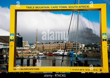Table Mountain in the distance as seen from Victoria & Alfred viewfront, Capetown, South Africa Stock Photo