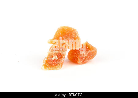 Group of three slices of dry papaya isolated on white background Stock Photo