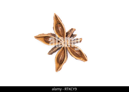 One whole dry brown star anise fruit like a butterfly flatlay isolated on white background Stock Photo