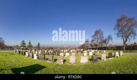 The hottest February on record - Fox Covert Cemetery overlooking Warrington Town in the sunshine Stock Photo