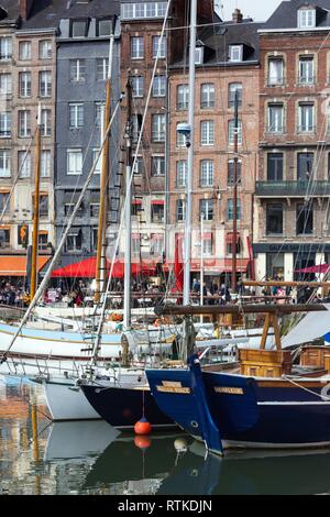 HONFLEUR, FRANCE - APRIL 8, 2018: view of the bay and the embankment  in the famous French city Honfleur. Normandy, France Stock Photo