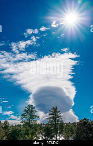 Lenticular cloud formations against cobalt blue sky; central Colorado; USA Stock Photo