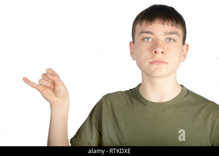 Caucasian teenage boy doing American Sign Language on one hand showing the symbol for J Stock Photo