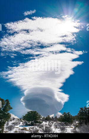 Lenticular cloud formations against cobalt blue sky; central Colorado; USA Stock Photo