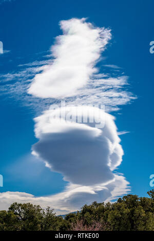 Lenticular cloud formations against cobalt blue sky; central Colorado; USA Stock Photo