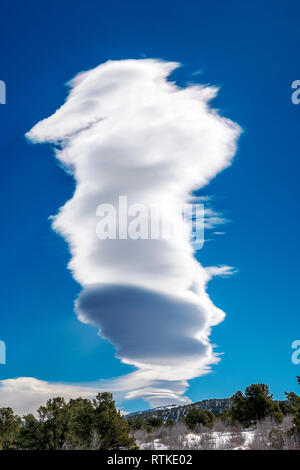 Lenticular cloud formations against cobalt blue sky; central Colorado; USA Stock Photo
