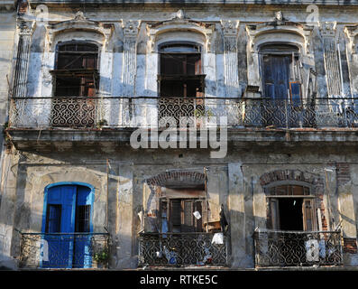 Detail showing apartment balconies at a residential building in Old Havana, Cuba. Many buildings in the capital are dilapidated and in need of repair. Stock Photo