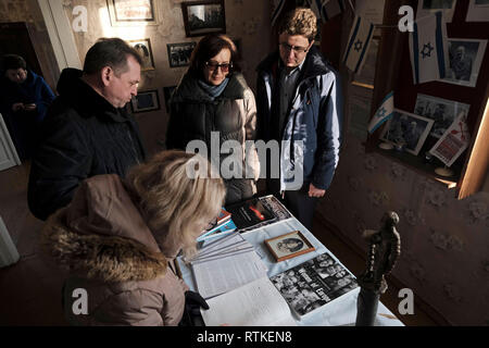 Visitors looking at documents displayed inside the house in which Chaim Weizmann, Israel's first President was born in Motol or Motal a township in Ivanava Raion of Brest Region which was once home to a large Jewish community and was annihilated by the Germans during the Second World War. Belarus Stock Photo