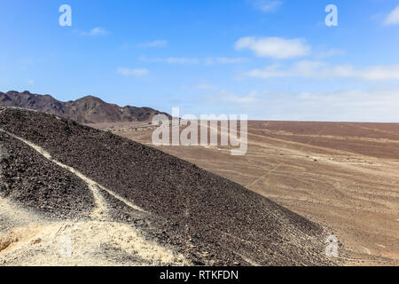 Hill from which you can see some straight lines of nazca that extend to the horizon Stock Photo