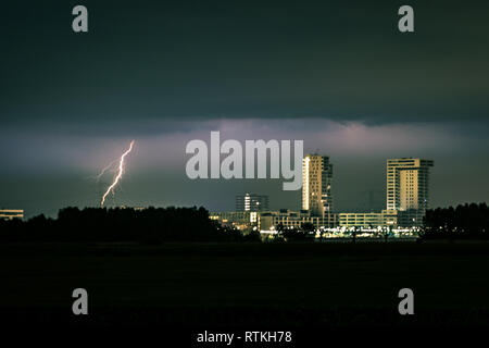 Lightning strike near the skyline of Rotterdam, The Netherlands.