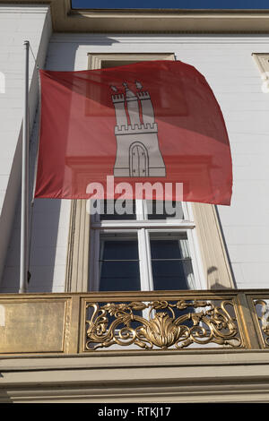 Historic House in Hamburg with flag Stock Photo