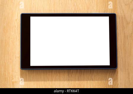 Tablet on wooden background Stock Photo