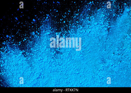 Powder Blue Drop Blue color background of chalk powder. Blue color dust particles ...