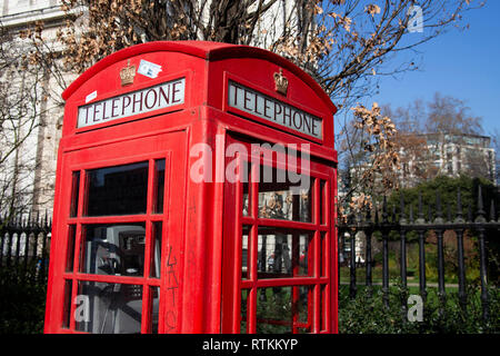 Old-fashioned red telephone box outside St Paul's Cathedral, London Stock Photo