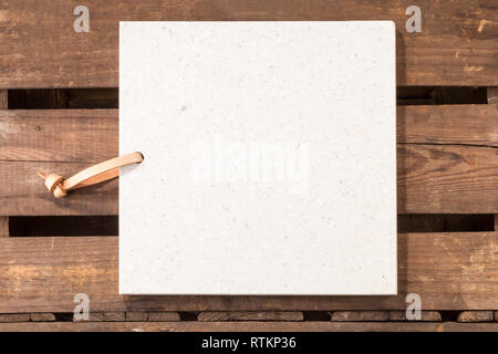 Concrete stone server/board/tray with space for text on rustic wood planks. Also available on white background and with different food arrangements. Stock Photo