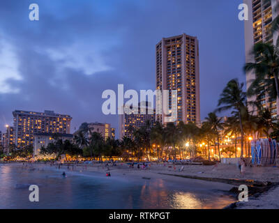 Waikiki beach in Honolulu on August 8, 2016 in Honolulu, Usa. Waikiki beach is neighborhood of Honolulu, best known for white sand and surfing. Stock Photo