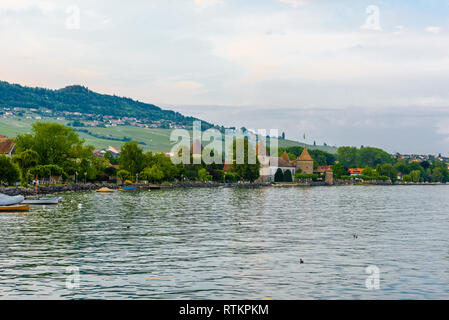Sunset with reflections on beautiful Geneva lake, Switzerland. Stock Photo