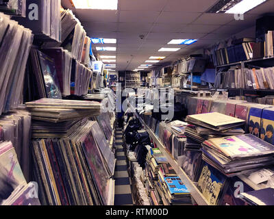 Retro styled image of boxes with vinyl turntable records on a flee market Stock Photo