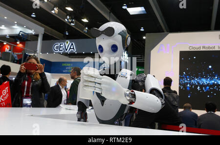The CloudMinds XR-1 robot welcomes visitors at their booth at the Mobile World Congress in Barcelona, Spain February 25, Stock Photo
