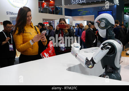The CloudMinds XR-1 robot welcomes visitors at their booth at the Mobile World Congress in Barcelona, Spain February 25, Stock Photo