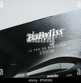 PARIS, FRANCE - DEC 18, 2017: Detail of BaByliss Paris hair dryer against white background Stock Photo