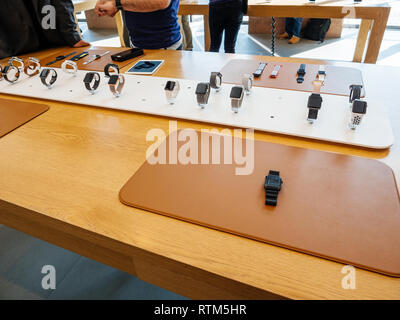 PARIS, FRANCE - SEP 22, 2017: New Apple Watch Series 3 goes on sale in Apple Store with presentation to customers of the plethora of watches and straps  Stock Photo
