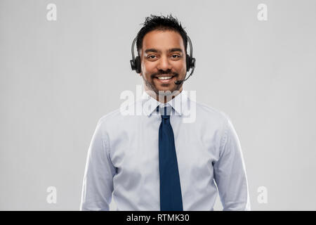 indian businessman or helpline operator in headset Stock Photo