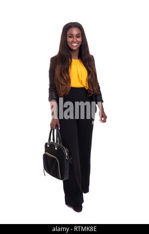 Back view of young african businesswoman holding briefcase isolated on white background Stock Photo