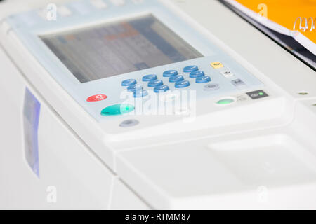 Detail of a modern digital printer of a copy center Stock Photo