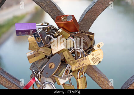 Forever love locks on bridge to Saint Angelo castle in Rome Italy Stock Photo