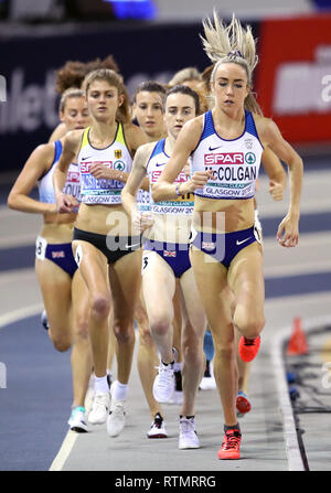 Great Britain's Laura Muir (centre) and Great Britain's Eilish McColgan (right) in the Women's 3000m final during day one of the European Indoor Athletics Championships at the Emirates Arena, Glasgow. Stock Photo