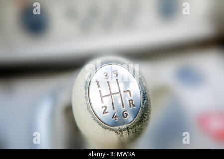 Close-up of Ball shift knob automatic transmission. Closeup car gearbox with blurred background. Switching in six steps and backing. Stock Photo