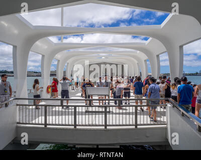 The USS Arizona Memorial on August 5, 2016 in Pearl Harbor, USA. Memorial marks resting place of sailors and Marines who died when the USS Arizona was Stock Photo