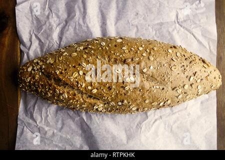 Fresh Loaf of Multi Seed Brown Wheat Bread, Crete, Greece Stock Photo