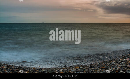 Lonely ship in the sea. Irish Sea. Conceptual. Stock Photo