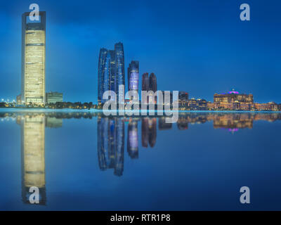 Panorama view of Abu Dhabi Skyline at sunset, UAE Stock Photo