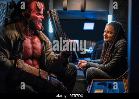 RELEASE DATE: April 12, 2019 TITLE: Hellboy STUDIO: Lionsgate DIRECTOR: Neil Marshall PLOT: Based on the graphic novels by Mike Mignola, Hellboy, caught between the worlds of the supernatural and human, battles an ancient sorceress bent on revenge. STARRING: DAVID HARBOUR as Hellboy, SASHA LANE as Alice Monoghan. (Credit Image: © Lionsgate/Entertainment Pictures) Stock Photo