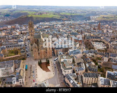 Aerial view of French city of Rodez with tower of Cathedral and spire of church of Saint Amans in autumn day Stock Photo