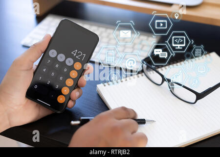 Man using  tablet computer  virtual interface graphic icons network diagram Digital marketing Stock Photo