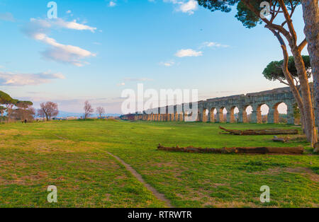 Rome (Italy) - The Parco degli Acquedotti at sunset, an archeological public park in Rome, part of the Appian Way Regional Park, with monumental ruins Stock Photo